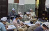 Muslimin Sedang Mendengar Penerangan Ustaz